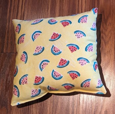 A photo of a square pillow - an available free handcrafted item from Community Threads