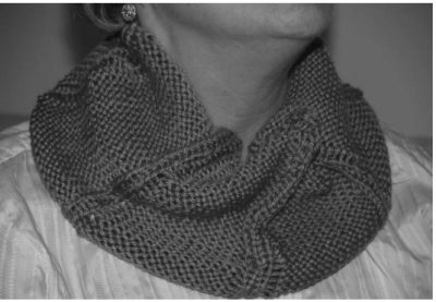 A photo of a knitted reversible stockinette neck warmer - an available free handcrafted item from Community Threads