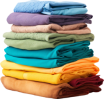 Picture of a stack of colorful clothes to show that you can donate clothing to Community Threads.